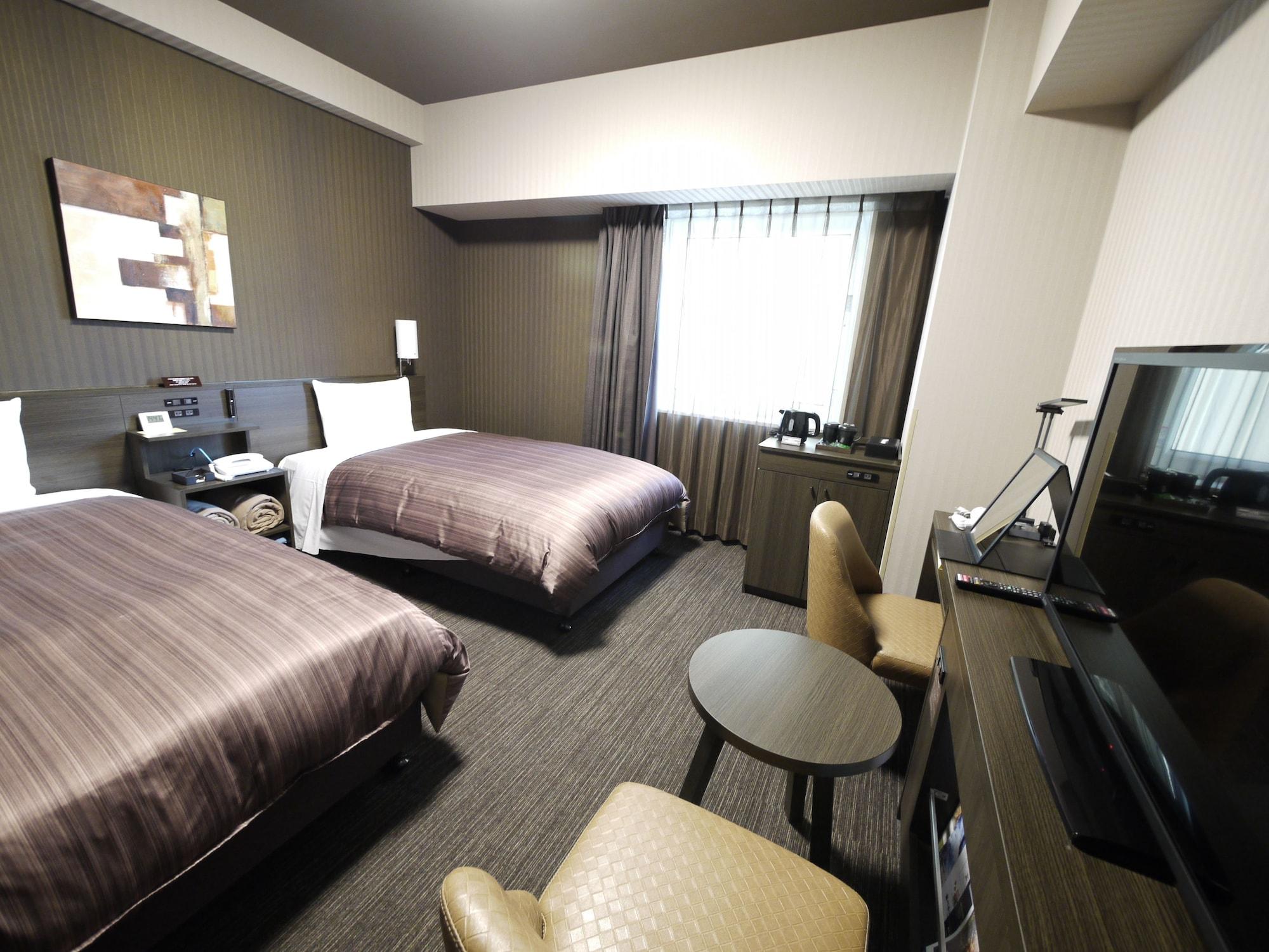 Hotel Route-Inn Chitose Ekimae Экстерьер фото
